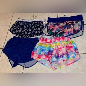14. Workout athletic shorts bundle (4) blue yellow pink stars  size S-M